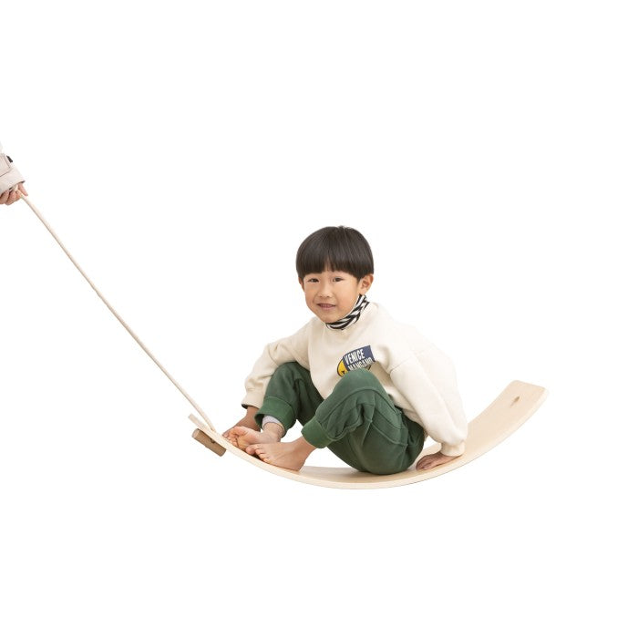 Wooden Balancing Board,Our Waldorf-inspired Wooden Balancing Board will stimulate both balance and strength. With its curved design, the Wooden Balancing Board can be used as both a rocker, supporting physical development, stability and core strength and also as a bridge or ramp when turned over. With the pull rope, child can sit on the balance board and be dragged along. It can be a seesaw, racing car track, surfing board, rocking ship, a bed, a bridge, a slide and so on. Use your imagination to unlock mor